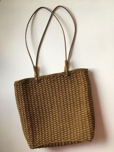 Jute tote with leather handles, polyester lining, magnetic clasp closure. Marble Candle Holder, Jute Totes, Chalk Bags, Market Tote, Beach Tote Bags, Shopping Tote Bag, Mesh Bag, Market Bag, Cotton Totes