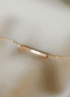 Versatile, practical and light-catching—this bracelet raises the bar. Personalize with names, dates, initials, coordinates or a short mantra (and wrap your wrist with what means most). Looking for something subtler? Try our teeny Basquiat Bar Bracelet (best for extra short, tiny inscriptions)! Looking for something bolder? Our Serra Bar Bracelet is our largest ID-type bracelet. Minimalist Yellow Gold Bracelets With Initials, Elegant Engraved Bar Necklace, Delicate Adjustable Name Bracelet For Everyday, Minimalist 14k Gold Nameplate Bracelet, Dainty Rose Gold Name Bracelet With Initials, Minimalist 14k Gold Bar Necklace For Everyday, Minimalist Jewelry With Engraving Option For Personalized Gift, Minimalist 14k Gold Bracelet For Personalized Gift, Minimalist 14k Gold Bar Necklace For Anniversary