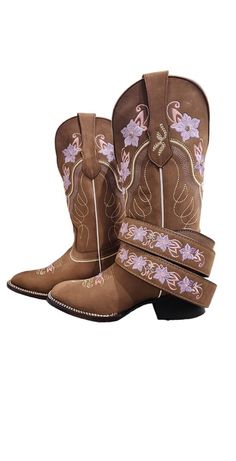 These beautiful embroidered women boots are crafted from the highest quality leather. The classic silhouette is perfect for pairing with jeans or dresses, and the intricate detailing adds a touch of sophistication to any outfit. They feature a comfortable mid-height heel and a cushioned insole for a comfortable fit. Whether you're looking for a statement piece or an everyday staple, these boots are sure to become a wardrobe staple. Embroidered Closed Toe Winter Boots, Spring Embroidered Boots For Rodeo, Winter Embroidered Heeled Boots With Round Toe, Western Embroidered Mid-calf Boots For Fall, Brown Embroidered Winter Boots, Embroidered Round Toe Heeled Boots For Fall, Embroidered Heeled Boots With Round Toe For Fall, Fall Embroidered Round Toe Heeled Boots, Brown Embroidered Western Boots