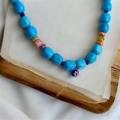 This handmade necklace is made of turquoise natural stone, glass and various beads. The necklace length is approximately 40 cm. My designs are unique like every woman. That's why I only make one of each, I'm sure you will enjoy wearing them as much as I do. Please do not hesitate to contact me for any questions. Colorful Beads Turquoise Necklace For Beach, Turquoise Bohemian Jewelry With Letter Beads, Bohemian Turquoise Beaded Necklace With Letter Beads, Turquoise Beaded Necklaces With Letter Beads For Beach, Large Beads Turquoise Necklace For Beach, Turquoise Beaded Necklace With Letter Beads For Beach, Large Round Beads Turquoise Necklace For Beach, Turquoise Necklace With Large Beads For Beach, Bohemian Letter Beads For Jewelry Making