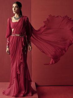 This set features a deep fuschia blouse and chiffon-organza draped ruffle saree paired with tie up embroidered belt. Color: Deep Fuschia Fabric: Chiffon; Organza Care: Dry Clean Only Lehenga Shoot, Red Ruffle Saree, Fuschia Blouse, Deep Fuschia, Baju Kahwin, Ridhi Mehra, Indian Wedding Lehenga, Saree Wearing, Lehnga Dress