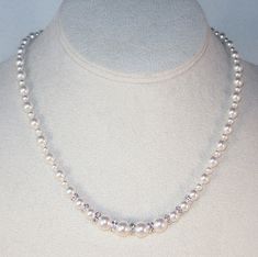 "Beautiful white Swarovski Pearls (4mm, 6mm and 8mm) separated by silver Swarovski rondelles with sparkling Swarovski crystals. Necklace is 16\" plus a 3\" silver extension with a 6mm white Swarovski pearl drop so you can wear it at any length from 16\" to 19\" and it can be worn for any occasion - casual, dressy, or formal. This would make a lovely gift for your wedding party - bride, bridesmaids, maid of honor, and flower girls. It can be made with any color that you want for your bridal party Classic White Necklace With Rhinestones, Classic White Rhinestone Necklace, White Bling Round Beads Jewelry, White Rhinestone Sterling Silver Necklaces, White Sterling Silver Necklaces With Rhinestones, Crystals Necklace, Casual Dressy, Pearl Jewelry Necklace, Pearl And Lace