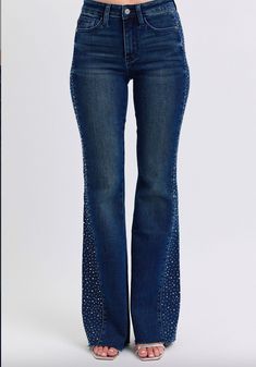 Judy Blue Rhinestone Side Panel Flare   76.2% Cotton, 22.5% Polyester, 1.3% Spandex Rise: 10" Inseam: 33.5"Model Info:Size: 1Height: 5'5Waist: 25"Hip: 36"