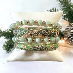 Stack of bangles and beaded bracelets  exactly as pictured Green Beaded Bracelets For Festive Occasions, Festive Stackable Beaded Bangle Bracelets, Festive Green Beaded Bangle Bracelets, Festive Green Stackable Bracelets, Bohemian Festive Bracelets With Faceted Beads, Bohemian Green Bracelets For Festive Occasions, Green Stackable Beaded Bangle Bracelets, Green Stackable Bangle Beaded Bracelets, Green Bangle Bracelet With Faceted Beads