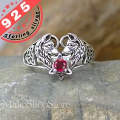 "Handmade Wolf couple heart shaped ring in sterling silver With/without birthstone This is an Handmade high quality sterling silver ring Materials: 925 sterling silver Stamped \"925\" Stone: 3mm round faceted birthstone (shown on pictures with January) Measurements: front 18mm wide Select bellow your size & stone. Comes with jewelry box Handmade in Canada by our silversmith artist. If you select no gemstone we will make a nice triquetra pattern instead Exclusively here directly from it's Designer Artist ! All our jewelry include a gift box. Matching cuff bracelet, earrings and pendant also available visit our shop for more: https://www.etsy.com/ca/shop/MakoshopStore" Wolf Couple, Couple Heart, Heart Shaped Ring, Box Handmade, Heart Shaped Rings, Locket, Cuff Bracelet, Silver 925, Birthstone