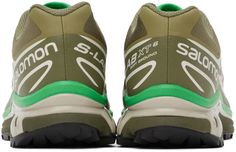 The Salomon Khaki & Green XT-6 sneaker is the perfect outdoor-inspired shoe for your active lifestyle. Featuring lightweight SensiFit mesh and a durable bonded trim throughout, these kicks were made for comfortably exploring nature-filled feeds. The Quicklace closure and padded collar provide a custom locked-in fit, while the OrthoLite insole and mesh lining keep feet fresh all day. With the Agile Chassis rubber midsole and grippy Contagrip outsole, you'll feel steady on any terrain. In trendy khaki and green tones made to match your hike and explore Instagram aesthetic, these Salomon sneakers allow you to soak up the sights in sustainable style. Breathable Khaki Sneakers For Outdoor Activities, Green Low-top Trail Running Shoes For Light Sports, Green Casual Sneakers For Trail Running, Green Running Shoes For Hiking, Green Trail Running Sneakers, Casual Green Sneakers With Ventilation, Green Low-top Running Shoes With Ventilation, Green Trail Running Sneakers With Rubber Sole, Green Breathable Trail Running Shoes With Round Toe