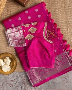 "Color : Pink and Silver Zari. Kanchipuram silk saree in pink donning shimmering silver appliques and border, paired with a self-colored blouse embroidered with silver zari and bead work. This saree is for sure to look even more stunning when worn for any occasion.  This saree is very easy to drape and falls elegantly making it so effortless to carry around. *Fall, Pico & Tassels : Done *Condition : New Saree With Stitched Blouse with Maggam work *Ready to Wear *Dry Clean Only Blouse:  Zardosi H Festive Pink Dola Silk Blouse Piece, Silver Tissue Silk Blouse With Zari Work, Pink Dori Work Chandbali Saree, Pink Tissue Silk Blouse With Traditional Drape, Festive Silver Chanderi Blouse Piece, Festive Pink Raw Silk Blouse Piece, Pink Unstitched Blouse For Festive Occasions, Pink Blouse Piece With Dori Work For Transitional Season, Pink Dola Silk Blouse Piece For Transitional Season