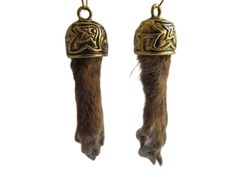 Real Mummified (Cured) Squirrel Foot/Paw Hoop Earrings. The paws are inside a detailed Gold Plated Pewter cap. The earrings measure 3 1/4"" long with the Gold-Plated Hoops. Wearing or carrying animal parts dates back more than 15,000 years and was believed to endow the wearer with the power of the creature. Comes in an Organza Bag along. Makes a nice gift Earrings will last a lifetime with proper care. Not recommended to wear while bathing or swimming. Animal Bone Jewelry, Bone Jewelry, Earrings Hoops, Animal Bones, Jewelry Workshop, Handcrafted Artisan Jewelry, Organza Bags, Earring Gifts, Artisan Jewelry