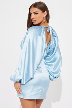 Available In Light Blue. Satin Mini Dress V-Neckline Long Balloon Sleeves V-Back w/ Tie Detail Hidden Back Zipper Length = 33" Self: 100% Polyester Imported | Shannon Satin Mini Dress in Light Blue size XL by Fashion Nova Baby Blue Dress Long Sleeve, Light Blue Satin V-neck Dress, Blue Satin Long Sleeve Mini Dress, Light Blue V-neck Mini Dress For Evening, Blue Satin Mini Dress, Bling Dress, Baby Blue Dresses, Blue Party Dress, Long Balloons