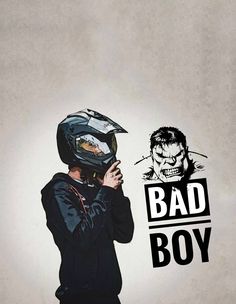 a man wearing a helmet with the words bad boy on it and an image of wolverine