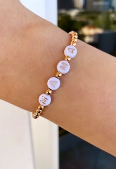 Dainty rose gold filled personalized custom name beaded ball bracelet with white and rose gold round circle letter initial beads. Stacking stretch bracelet, layering jewelry. Perfect addition to your arm party! REAL 14K Gold & Rose Gold Filled, and 925 Sterling Silver Beads (NOT PLATED, WILL NOT TARNISH) - These bracelets are made with high quality gold filled and sterling silver beads are lightweight, easy to wear and so comfortable you can sleep and shower in them. Minimalist design, great for Cheap Adjustable Pink Name Bracelet, Rose Gold Beaded Bracelets As Gift, Elegant Personalized Rose Gold Beaded Bracelets, Elegant Personalized Rose Gold Beaded Bracelet, Adjustable Rose Gold Beaded Bracelet With Letter Beads, Elegant Personalized Stretch Bracelet With Round Beads, Adjustable Rose Gold Beaded Bracelet, Elegant Rose Gold Bracelet With Letter Beads, Adjustable Rose Gold Jewelry With Letter Beads