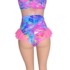 Introducing our Rave Bikini Bottom with Mesh Ruffle, the ultimate blend of sass and style for the dance floor diva in you! These hot pants are designed to make a statement with their high-thigh cut and super cheeky design, guaranteed to turn heads and set the dance floor on fire. The highlight of these hot pants is the mesh ruffle detailing on the sides, adding a touch of flirtatious flair and playful movement to your outfit. Whether you're grooving to the beat at a rave, hitting the club scene, Flirty Fitted Beach Bottoms, Flirty Fitted Bottoms For Beach, Rave Party Shorts With Stretch, Stretch Rave Party Shorts, High Waist Fitted Swimwear For Festivals, Stretch Rave Shorts For Party, Fitted Multicolor Party Shorts, Fitted Disco Swimwear For Club, Stretch High Waist Swimwear For Club