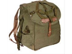 The Original Romanian Army Bread Bag is a vintage military item made of olive canvas, designed for carrying essentials and gear during military operations. Here are the key features and specifications:* Material: Constructed from durable olive canvas, providing reliability and resilience in various conditions. * Straps: Equipped with leather straps for comfortable carrying and secure closure of the bag. * Capacity: Offers a capacity of approximately 30 liters, providing ample space for storing v Outdoor Military Satchel Bag, Military Style Outdoor Satchel Bag, Military Style Satchel For Outdoor, Military Style Satchel Bag For Outdoor, Khaki Standard Backpack With Canvas Lining, Khaki Canvas-lined Standard Backpack, Military Style Canvas Bag With Pockets, Military Style Outdoor Bags With Pockets, Military Style Khaki Backpack For Outdoor Activities