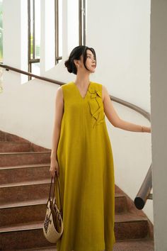 Spring V-neck Ramie Dress, Elegant Linen V-neck Maxi Dress, Linen V-neck Sundress Maxi Dress, Spring Daywear Dress With Notched Neckline, Spring V-neck Linen Dress, Elegant Dresses With Notched Neckline For Vacation, Summer Daywear Dress With Split Neck, V-neck Ramie Linen Dress, Elegant Linen V-neck Dress For Spring