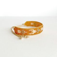 Everyday Yellow Beaded Friendship Bracelets, Dainty Adjustable Beaded Bracelet, Hand-strung Beads As Gift, Orange Beaded Bracelets For Everyday Wear, Adjustable Beaded Bracelet With Tiny Beads As Gift, Orange Handmade Friendship Bracelets, Bohemian Beaded Bracelet With Adjustable Length For Everyday, Handmade Orange Friendship Bracelets For Everyday, Adjustable Beaded Bracelets For Everyday