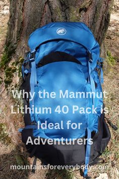 a blue backpack sitting on the ground next to a tree with text overlay that reads, why the mammut lithium 40 pack is ideal for adventurers