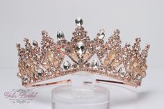 "FAST SHIPPING Beautiful sparkling crystal tiara in rose gold plated. Perfect for your Quinceañera, Wedding, First Communion or Confirmation. It has a loop at the end of each side to attach it in your hair with bobby pins for added security. Approx.  3\" tall  We usually ship within 1-2 business days. Style DAT225RG" Rose Gold Quince Crown, Elegant Crystal Crown For Wedding, Silver Crystal Wedding Crown, Elegant Gold Wedding Crown, Gold Princess Crown For Wedding, Wedding Crown With Structured Princess Style, Wedding Crown With Rhinestones, Elegant Gold Crown With Rhinestones, Pink Crown-shaped Wedding Jewelry