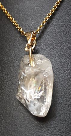 DANBURITE CRYSTAL PENDANT A beautiful and exquisite natural gem. We select the most gorgeous crystals with perfect terminations for this pendant. It is a natural made gemstone. An excellent clear and sparkling crystal. Each pendant is unique. Crystal: 2.5 cm x 1.4 cm DANBURITE METAPHYSICAL PROPERTIES -Enlightenment : Opens your heart -Patience and understanding: Seeing all situations from a heart based perspective -Angel and Spirit guide connection: allowing you to easily connect with your Angel Clear Crystal Spiritual Necklaces, Spiritual Clear Crystal Necklace, Clear Quartz Crystal Necklace With Gemstone, Clear Gemstone Crystal Necklaces For Jewelry Making, Spiritual Clear Crystal Pendant Necklace, Spiritual Clear Quartz Crystal Necklace, Clear Crystal Gemstone Necklaces, Clear Crystal Necklaces With Gemstone, Clear Quartz Gemstone Crystals