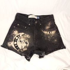 Vintage late 90s/y2k black denim GAP shorts cut off and frayed Bleach dyed with moon/stars and mushroom designs! tag size 29 waist - Please see measurements below for a true and accurate fit In very good condition, upcycled by me! MEASUREMENTS (laying flat)  WAIST 14 inches side to side HIPS 17 inches side to side RISE 11 inches from cotch seam to top of waist INSEAM 3 inches Mushroom Designs, 90s Shorts, Y2k Black, Bleach Dye, Late 90s, Gap Shorts, Moon Stars, Upcycled Vintage, Cut Off Shorts