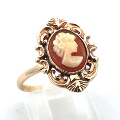 * Victorian 10k Yellow Gold Oval Carved Cameo Floral Scroll Statement Ring * Ring Size: 8 * Top Of Ring Measures: 1/2" X 3/4" * Height: 3/8" * Band Width: 1.75 Mm * Oval Cameo Measures Approximately 10.0 Mm X 8.0 Mm * Ring Weight: 1.9 Tgw * Marked: 10k * Ring Can Be Resized For An Additional Price. * Condition: As Pictured. * G4350 Jewelry Victorian, Cameo Necklace, Ring Ring, Statement Ring, Statement Rings, Ring Size, Accessory Gift, Jewelry Necklaces, Gift Card