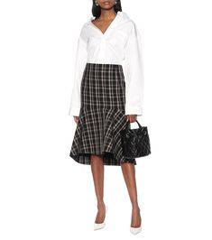 Checked wool midi skirt in black - Balenciaga | Mytheresa Chic Plaid Skirt For Workwear, Elegant Plaid Skirt For Work, Chic Ruffled Skirt For Workwear, Chic Tiered Skirt For Fall, Chic Plaid Relaxed Skirt, Chic Relaxed Plaid Skirt, Chic Plaid Flared Skirt, Chic Plaid Midi Skirt, Plaid Full Skirt For Work