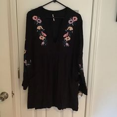 Deep V Neck, Pockets And Covered Buttons On Sleeves. Pull On Style Casual Long Sleeve Embroidered Dress With Floral Embroidery, Casual Long Sleeve Dress With Floral Embroidery, Casual Long Sleeve Floral Embroidered Dress, Fall Floral Print Long Sleeve Embroidered Dress, Casual Black Long Sleeve Embroidered Dress, Long Sleeve Embroidered Floral Dress For Fall, Casual Embroidered Floral Dress For Fall, Casual Fall Embroidered Dress With Floral Print, Black Long Sleeve Dress With Floral Embroidery