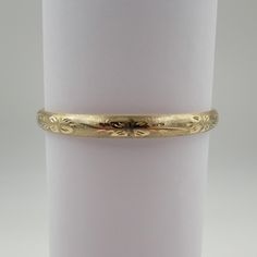 14 Kt Y.G. Engraved Bangle Classic Etched Gold Bracelet For Formal Occasions, Classic Gold Etched Bangle, Elegant Etched Yellow Gold Bangle, Heirloom Yellow Gold Bangle Cuff Bracelet, Ceremonial Engraved Yellow Gold Bracelet, Yellow Gold Bangle With Decorative Band, Yellow Gold Etched Bangle, Yellow Gold Bangle Bracelet With Decorative Band, Gold Bracelet With Decorative Band For Anniversary