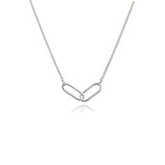 "A lovely handmade sterling silver necklace featuring two contrasting interlocked oval links. Simple yet stylish and ideal for everyday wear. A piece that is sure to become a favourite. An ideal gift for occasions such as birthdays or Christmas or simply as a treat for yourself. Measurements: Each of the links measures approximately 2cm long and 1cm wide. The thickness of the links is 2mm. Available on a choice of 16\" or 18\" chain. This necklace forms a part of our new Links collection consisting of a series of pieces featuring contrasting plain and beaded oval links. Make sure to take a look at the complimenting earrings and rings in the same collection for a beautiful coordinated look. Also available in 18ct gold vermeil. All our jewellery comes beautifully packaged, wrapped in black t Black Tissue Paper, Chain Ring, Link Necklace, Silver Hoops, Handmade Sterling Silver, Bar Necklace, Sterling Silver Necklace, Tag Necklace, Gold Beads