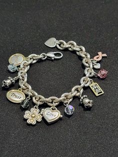 "Brand: BRIGHTON ALL YOU NEED IS LOVE.... Chunky silver-plated chain. Quality Austrians crystal beads. This beautiful symbolic charms bracelet is perfect for all of us. Deadstock from the '90s *8.5\" long Excellent condition Perfect gift. Thank you for visiting my store. You can also visit my MargaretJewelryShop or http://jewelryandclothing.net/ **Please read \"The Private Policy\"" Cheap Adjustable Chain Charm Bracelet, Love Charm Bracelet, Silver Metal Charm Bracelet, Metal Charm Bracelet With Dangling Charms, Gold Charm Bracelet With Silver Chain, Silver Heart Charm Chain Bracelet, Silver Chain Bracelet With Charms For Jewelry Making, Silver Bracelet With Dangling Charms, Silver Metal Chain Bracelet With Heart Charm