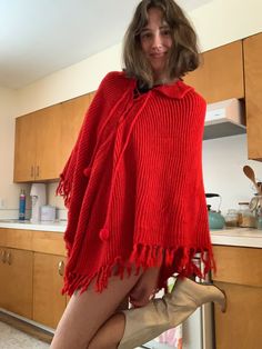 Poncho is a one size fits all size. Cozy Knit Cape Poncho, Knit Fabrication Poncho For Fall, One Size, Knit Fabrication One-size Poncho For Fall, Casual One Size Knit Poncho, Oversized Cozy Knit Cape, One Size Knit Poncho For Fall, Cozy Oversized Knit Cape, Winter Poncho Cape In Knit, One Size Red Knitted Outerwear