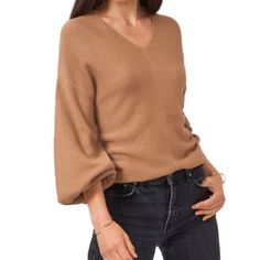 Mild Oak Chic V-neck Sweater With Ribbed Cuffs For Fall, Chic Knit Tops With Balloon Sleeves, Chic Knit Balloon Sleeve Tops, Trendy V-neck Sweater For Workwear In Fall, Fall Knit Tops With Balloon Sleeves, Casual Balloon Sleeve Sweater For Fall, Casual Balloon Sleeve Spring Sweater, Knit Tops With Balloon Sleeves For Fall, Fall Balloon Sleeve Knit Tops