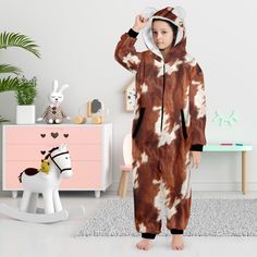 This Cow Print Big Kids Pajama Hooded Onesie is perfect for keeping your little one cozy and warm. It is made out of a soft material that will provide all-day comfort. Designed with a hood and pockets, it is sure to become your child's favorite sleepwear! If you like our custom robes, you will love these! These feel like a minky baby blanket. PLEASE ALLOW UP TO 14 BUSINESS DAYS TO RECEIVE YOUR ORDER. EACH ONE IS MADE TO ORDER AND SHIPPED DIRECTLY TO YOU FROM OUR MANUFACTURER. 17.60 Oz. Made from Custom Robes, Print Pajamas, Plus Size Shopping, Kids Pajamas, Blankets For Sale, Caicos Islands, Cow Print, Turks And Caicos Islands, Big Kids