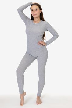 This thermal legging is an essential layering piece for the winter. Made of our 50/50 poly cotton waffle knit that keeps you comfortably warm and cozy. Features a 1" elastic waistband, ribbed ankle cuffs and finished with durable flatlock seams. Try pairing with our matching T3007 Baby Thermal Top for a cute sleep or loungewear look. Runs slightly small, we recommend sizing up if you are in-between sizes. Made in Los Angeles, Calif. Our experienced sewers earn up to $25 an hour and no less than Tight Ribbed Leggings For Loungewear, Tight Long Sleeve Winter Activewear, Tight Ribbed Activewear For Loungewear, Ribbed Tight Activewear For Loungewear, Fitted Solid Ribbed Leggings, Fitted Solid Color Ribbed Leggings, Solid Color Fitted Ribbed Leggings, Fitted Ribbed Leggings For Loungewear, Stretch Ribbed Leggings For Loungewear