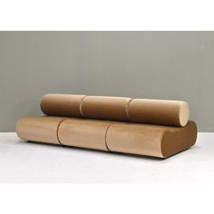 three rolls of cardboard sitting on top of each other