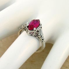 Vintage Estate Marquise Cut Lab Created Ruby Solitaire Filigree Ring. 925 Solid Sterling Silver. The Top Of The Ring Measures 3/8 Inches In Length. Set With One High Quality 10x5 mm Marquise Cut Lab Created Ruby Stone. Stamped 925. Excellent Condition/Like New. Red Lab, Red Band, Ruby Stone, Filigree Ring, Ruby Ring, Marquise Cut, Art Deco Design, Antique Style, Vintage Art Deco