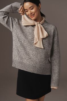 Add a touch of coziness to your close-knit circle with the Endless Rose Tie-Neck Oversized Sweater, adding a sweet accent to your winter wardrobe. | Tie-Neck Oversized Sweater by Endless Rose in Grey, Women's, Size: XS, Polyester/Nylon/Wool at Anthropologie Chic Soft Knit Sweater For Layering, Elegant Beige Sweater With Soft Texture, Chic Wool Sweater For Layering, Elegant Fall Sweater With Soft Texture, Solid Color Soft Sweater For Winter, Beige Sweater For Layering With Soft Texture, Chic Sweater For Cold Weather, Elegant Neutral Sweater For Layering, Taupe Soft Knit Sweater For Layering