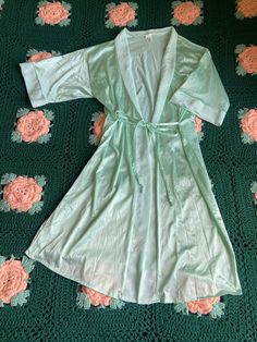 Pretty pastel green robe. Brand- Petra fashions. Size- medium. 1980s. Gorgeous color. Tie waist. Good condition! Green Spring Loungewear Robe, Green Spring Robe For Loungewear, Green Sleep Robe, Vintage Long Sleeve Robe For Spring, Green Wrap Robe For Spring, Vintage Spring Loungewear Robe, Spring Vintage Loungewear Robe, Spring Vintage Robe For Loungewear, 80s Pastel