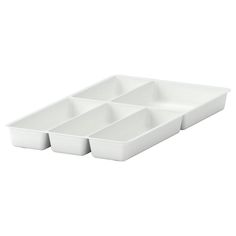 three white dishes sitting on top of each other