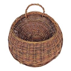 a brown wicker basket with handles