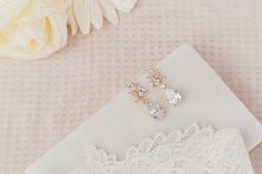 Elegant teardrop bridal earrings featuring a leaf motif and teardrop pendant. Teardrop Bridal Earrings, Pink Shop, Wedding Bridesmaid Jewelry, Inexpensive Wedding, Charlotte Wedding, Necklaces And Bracelets, Leaf Motif, Wedding Bridal Jewellery, Bridesmaid Necklace