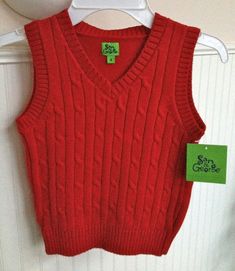 Sam & George  BOYS  RED CABLEKNIT SWEATER VEST SIZE 4 CHEST 12.5" LENGTH 16" RETAIL $36.00 NWTS We are available for questions Monday through Friday during business hours for specific questions about any items, shipping and more. E-bay considers a 5 Star feedback standard for all purchases. If for any reason you have any concerns with your purchase(s), please let us know directly and soon after receiving your purchase and we will do our best to work out a solution. Most of our transactions go sm Fall Cotton Stretch Sweater Vest, Fitted Casual Sweater In Solid Color, Classic Cotton Knitted Tops, Casual Solid Color Cotton Sweater Vest, Casual Solid Cotton Sweater Vest, Red Casual Sweater Vest For Spring, Casual Red Sweater Vest For Spring, Fitted Solid Color Cable Knit Top, Casual Sleeveless Cotton Sweater