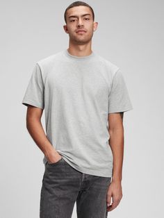 Made with 100% organically grown cotton.  Organic cotton is better for people and the environment because it's grown without the use of harmful synthetic pesticides and fertilizers.  Crewneck.  Short sleeves. Grey Tshirt, Pesticides, Fashion Story, Gray Tshirt, Striped Shorts, Daily Fashion, White Undershirt, Heather Grey, Gap