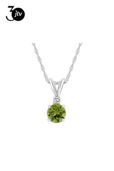 5mm round peridot with diamond accent rhodium over 14k white gold pendant with 18" rope chain. Measures approximately 0.54" L x 0.20" W. Spring ring clasp. Fine Jewelry With Round Cut Peridot, Green Round Pendant Jewelry With Diamond Accents, White Gold Peridot Jewelry With Birthstone, White Gold Peridot Jewelry For May Birthstone, White Gold Peridot Jewelry With Prong Setting, White Gold Round May Birthstone Necklace, White Gold Peridot Round Cut Jewelry, White Gold Round Necklace For May Birthstone, White Gold Pendant