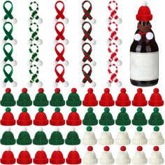 a bottle of wine surrounded by knitted hats and christmas decorations, all decorated in different colors