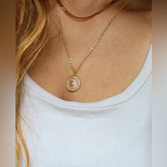 Luxury Minimalist Bohemian Rare Electric Picks Sunburst Medallion Necklace -Stunning Sunburst Medallion Pendant Necklace That Shines Brightly With Any Outfit. The Simplistic Beauty Of The Pendant On The Elegant & Dainty Chain Makes It The Perfect Piece To Wear From Work To A Night Out, Or Layered With Other Pieces From Your Closet Or Mine -18k Gold Plated Brass Casting, Elegant & Dainty Chain W/Spring Ring Clasp, Tag Next To It With Gf 18k & Not Sure What Under That Embossed, Charm W/Electric Pi Necklace Video, Black Dress Jacket, Minimalist Bohemian, Dainty Chain, Medallion Necklace, Harper’s Bazaar, Spring Rings, Womens Jewelry Necklace, 18k Gold