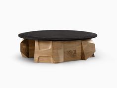 a wooden table with a black top on it