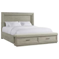 a bed with two drawers underneath it and white sheets on the bottom half of the bed