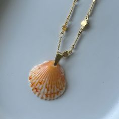 Rare Finds are truly one of a kind! You will receive the exact seashell pictured. Click on a number to view each rare find. Updated every month! Chain Length: 17 inches (second photo for size reference) Material: 24k Shiny Gold Plated Brass Multicolor Shell-shaped Necklace For Gift, Gold Shell-shaped Necklace For Vacation, Tiny Gold Hoop Earrings, Sunset Necklace, Multicolor Shell-shaped Jewelry For Beach, Handmade Brown Shell-shaped Necklace, Bohemian Multicolor Shell-shaped Jewelry, Dainty Pearl Necklace, Seashell Earrings