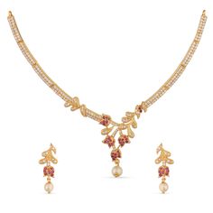 PRICES MAY VARY. MATERIAL: Jivisha jewelry set is made out of Brass with high quality Gold-Plating. This Floral theme piece is studded with opulent white red cubic zirconia stones and induced pearls. FEATURE: This traditional jewelry set includes 1 pair drop earrings and 1 short necklace, length (Necklace-9 cm ,Earring-1.5 cm) and weight (Necklace-20 gm,Earring-2 gm). The necklaces comes with Fishhook closure and has adjustable length. GIFTING: This necklace set arrives in unique and stylish pac Tarinika Jewellery, Bridesmaids Party, Jewelry For Brides, Bridal Jewelry Set, Indian Jewelry Sets, Length Necklace, Earring For Women, Wedding Bridal Jewellery, Floral Theme