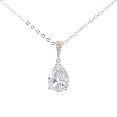 "Our new Avery pendant is made with a gorgeous teardrop cut crystal stone that sparkles like crazy.  - 18\" length (free custom sizing) - Crystal stone measures 10mm x 14mm - Silver, gold, or rose gold - Easy returns SHOP THE COLLECTION: https://www.etsy.com/shop/TigerlillyCouture PACKAGING: Arrives in a custom Tigerlilly box, perfect for gifting and storing the jewelry. Printed receipts are not included in the box. You may print a receipt directly from Etsy for your records. If it is a gift, we will print your custom gift message and include it in the package. To include a gift message, choose the \"This order is a gift\" box on the shopping cart page, and write your message in the box below. SHIPPING TO USA: This piece will ship from our studio within 1 business day of your order. We shi Gold Bracelet Wedding, Crystal Wedding Necklace, April Birthstone Necklace, Gold Leaf Pendant, Gold Bridal Necklace, Crystal Earrings Wedding, Gold Earrings Wedding, Pearl Earrings Wedding, Diamond Birthstone